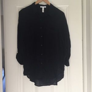 Navy blue button down shirt with roll up sleeves